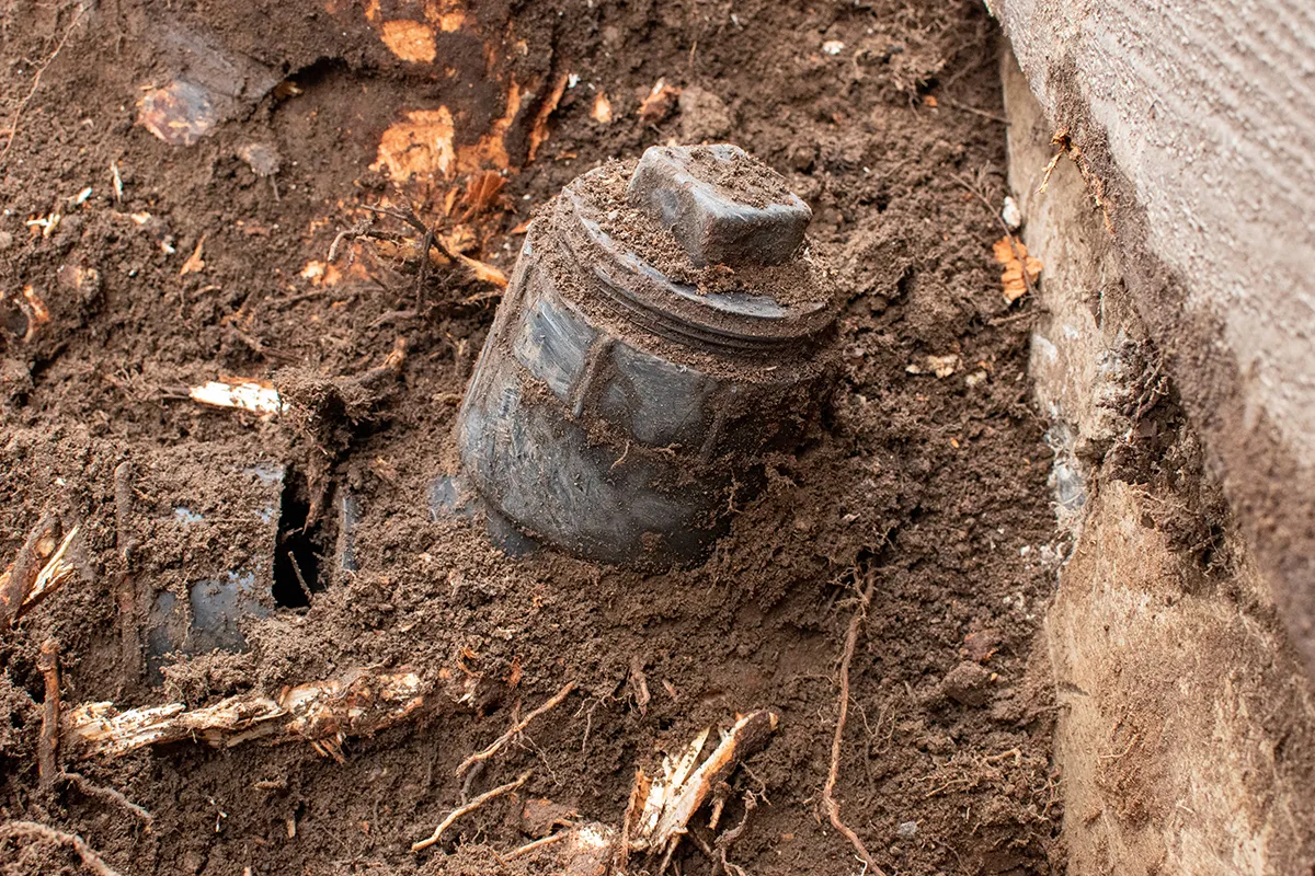 Exposed sewer pipe and roots affecting sewer line replacement cost Gastonia