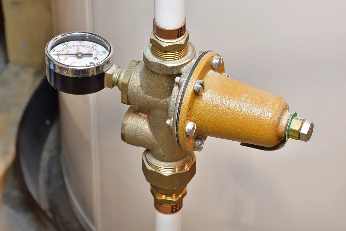 PRV valve with pressure gauge installed on home plumbing line