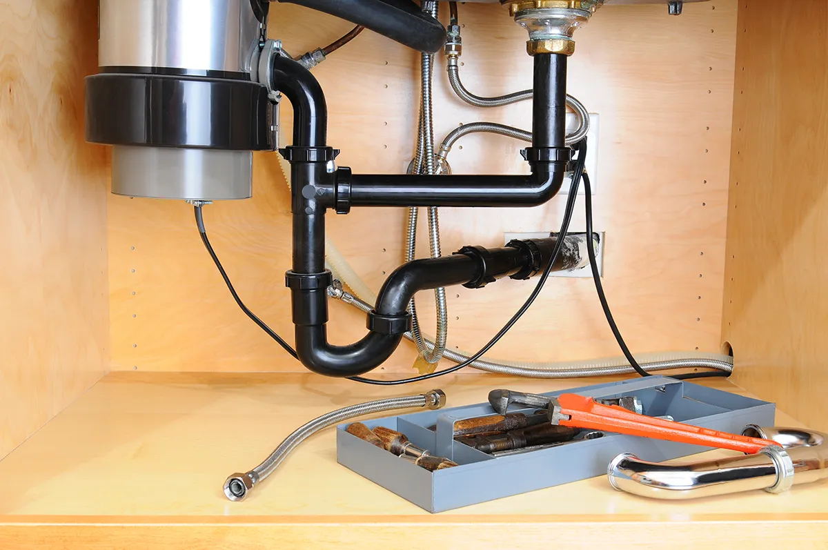 garbage disposal leaking from bottom