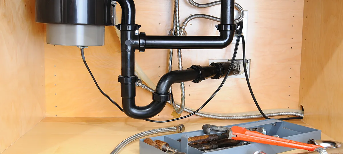 Garbage Disposal Leaking from Bottom: Causes & Fixes